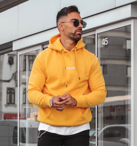 Yellow  Hoodie With Small  Embossed Print